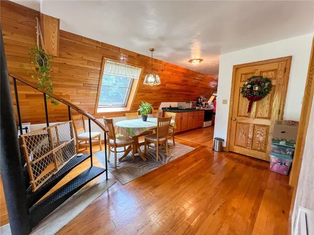 wooden floor with outdoor view