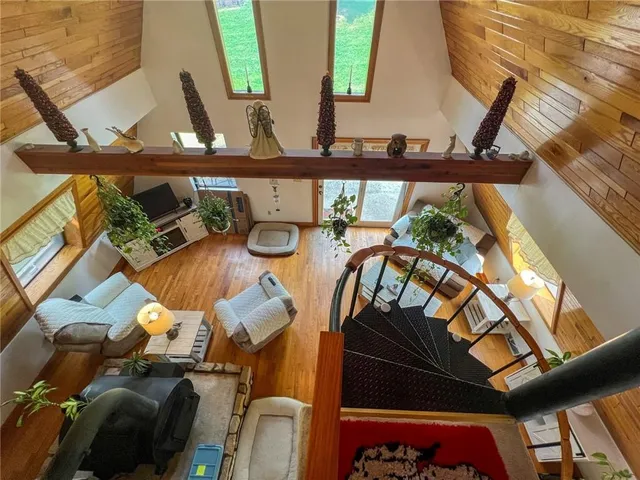 a view of a balcony with chairs