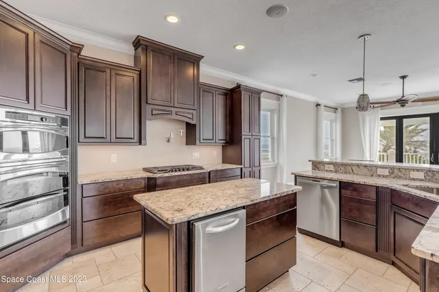 a view of a field with ocean view