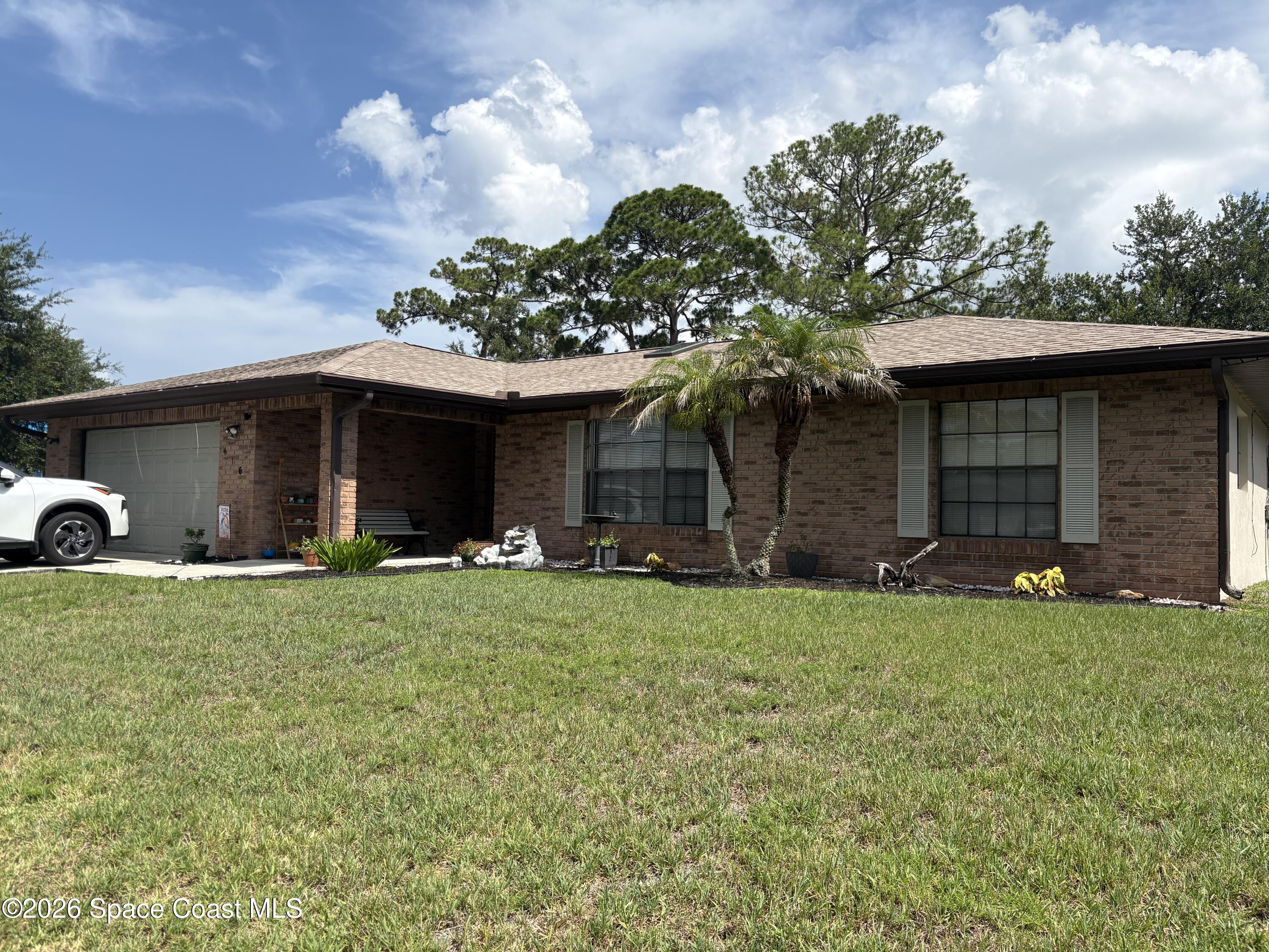 416 Orlov Road Northwest Palm Bay, FL 32907 - Photo 1 of 21 front