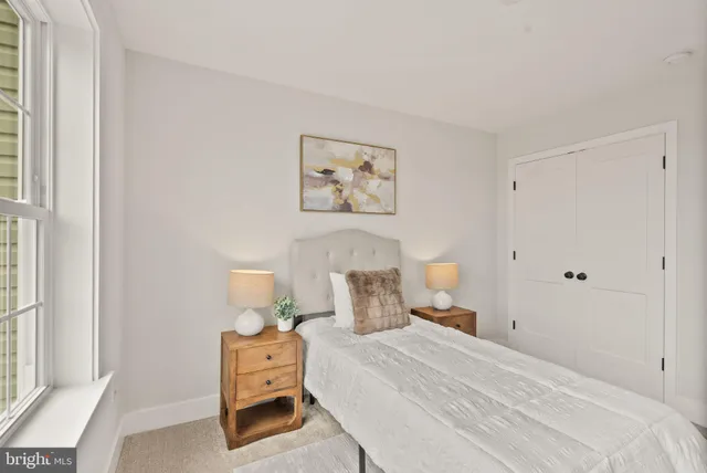 a bathroom with a sink toilet a mirror and shower