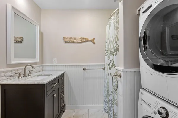 a bathroom with a sink and mirror