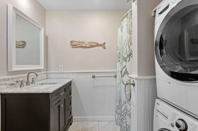 a bathroom with a sink and mirror