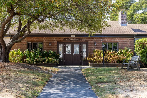 a view of a pool with a yard