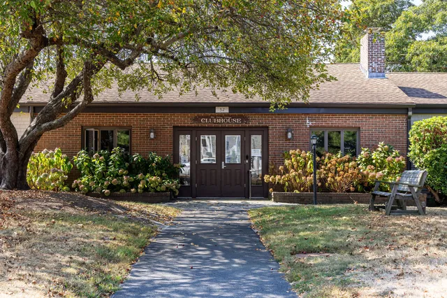 a view of a pool with a yard