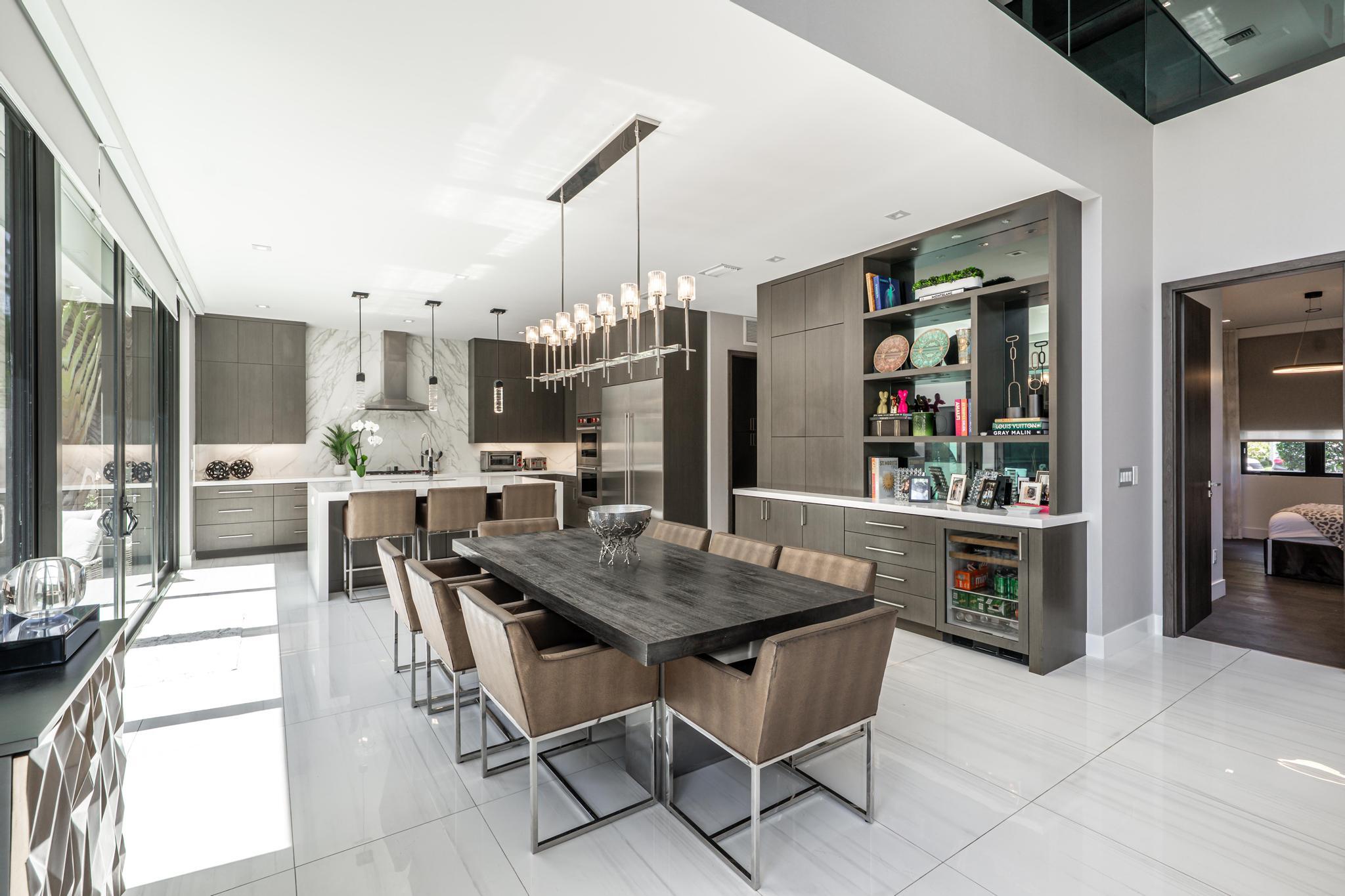 520 Northeast 4th Lane Boca Raton, FL 33432 - Photo 12 of 40 a view of a dining room kitchen and furniture