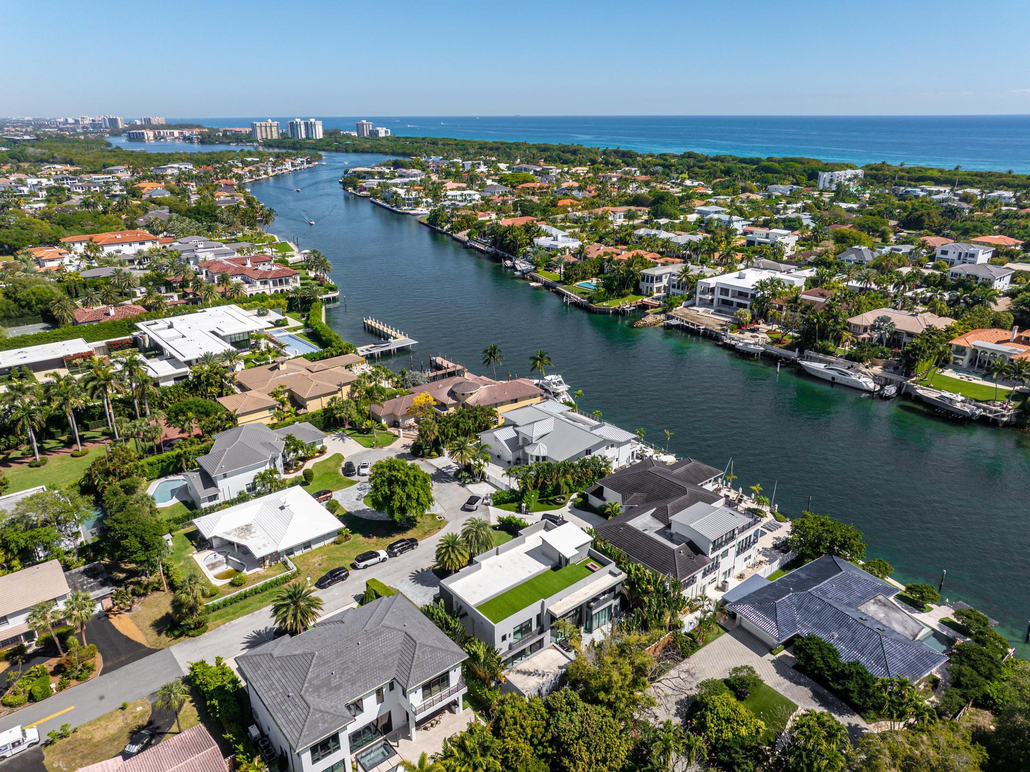 520 Northeast 4th Lane Boca Raton, FL 33432 - Photo 40 of 40 an aerial view of residential houses with outdoor space and lake view