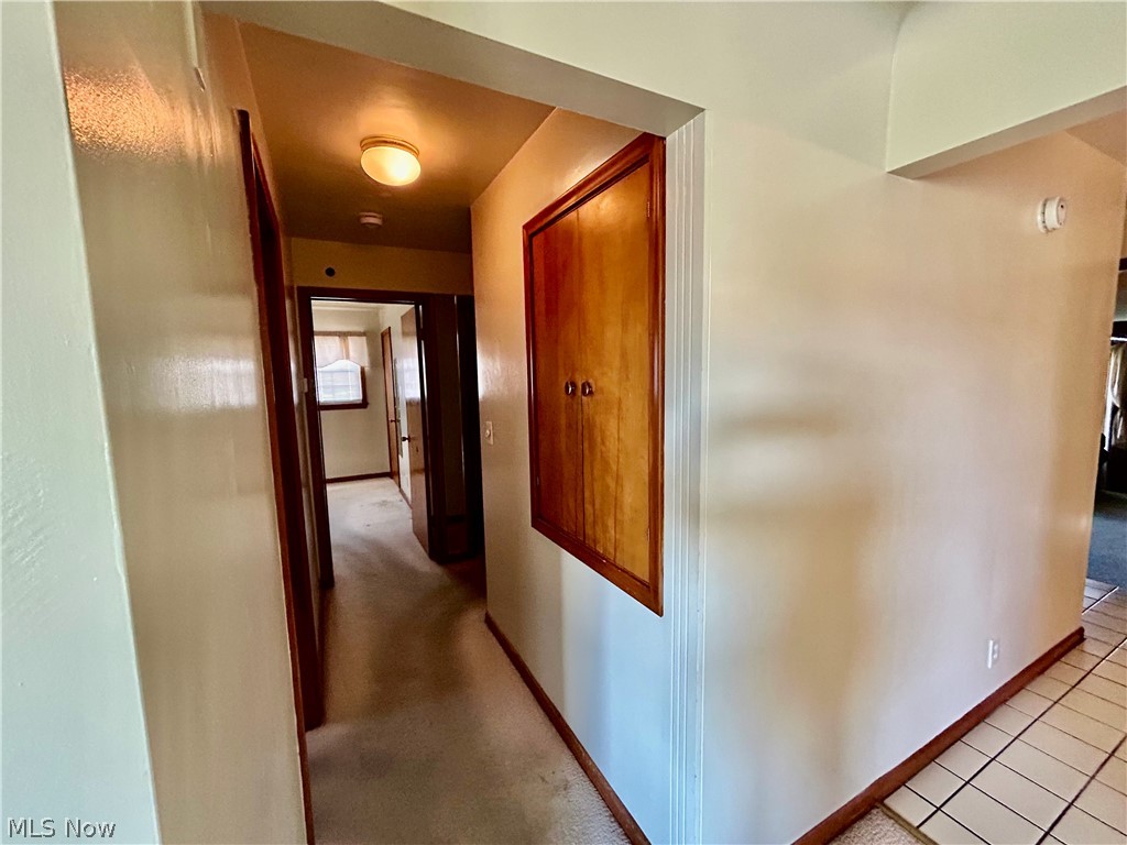 501 Edison Street Struthers, OH 44471 - Photo 11 of 23 Hallway with wall storage closet