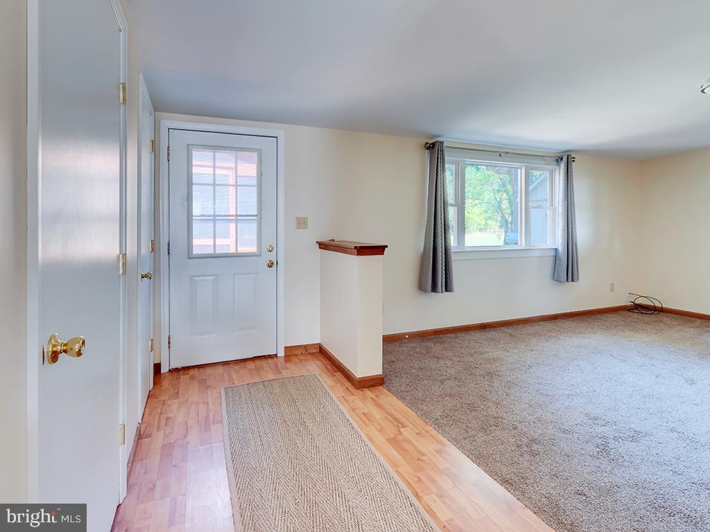 26571 Broadkill Road Milton, DE 19968 - Photo 16 of 23 Living room with separate entrance