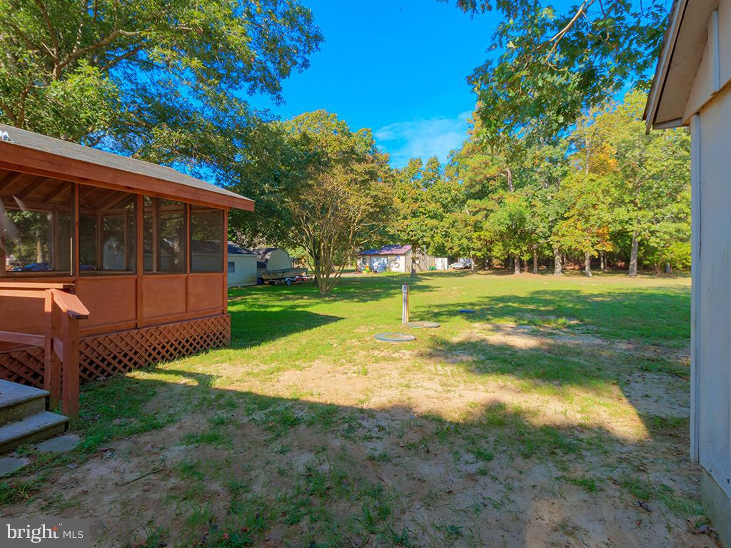 26571 Broadkill Road Milton, DE 19968 - Photo 22 of 23 Back deck leading to shed