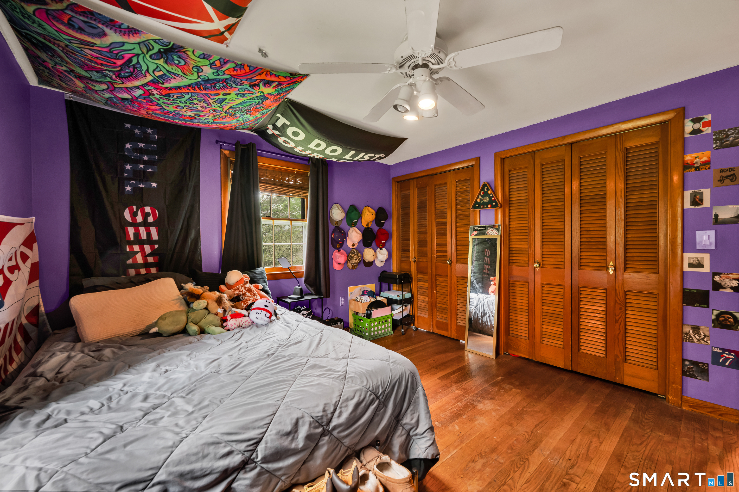 85 Timothy Road Naugatuck, CT 06770 - Photo 15 of 30 a bedroom with a bed and a chandelier