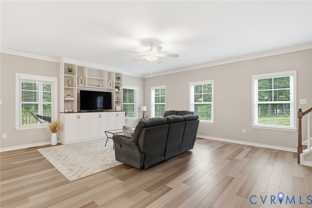 7598 Rural Point Road Mechanicsville, VA 23116 - Photo 6 of 41 a living room with furniture and a flat screen tv
