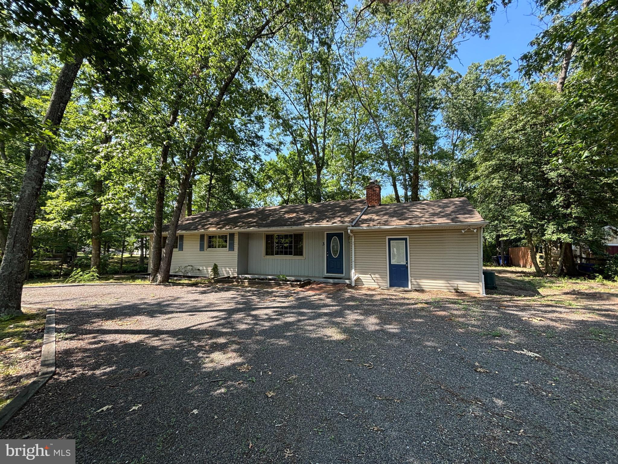 3 Cedar Trail Medford, NJ 08055 - Photo 1 of 22 a view of a house with a patio and a yard