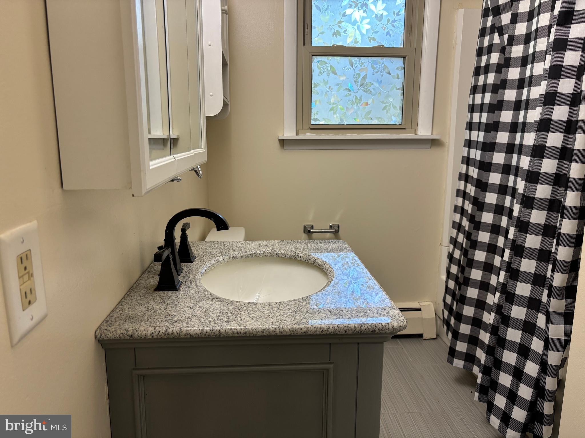 3 Cedar Trail Medford, NJ 08055 - Photo 11 of 22 a bathroom with a granite countertop sink and a mirror