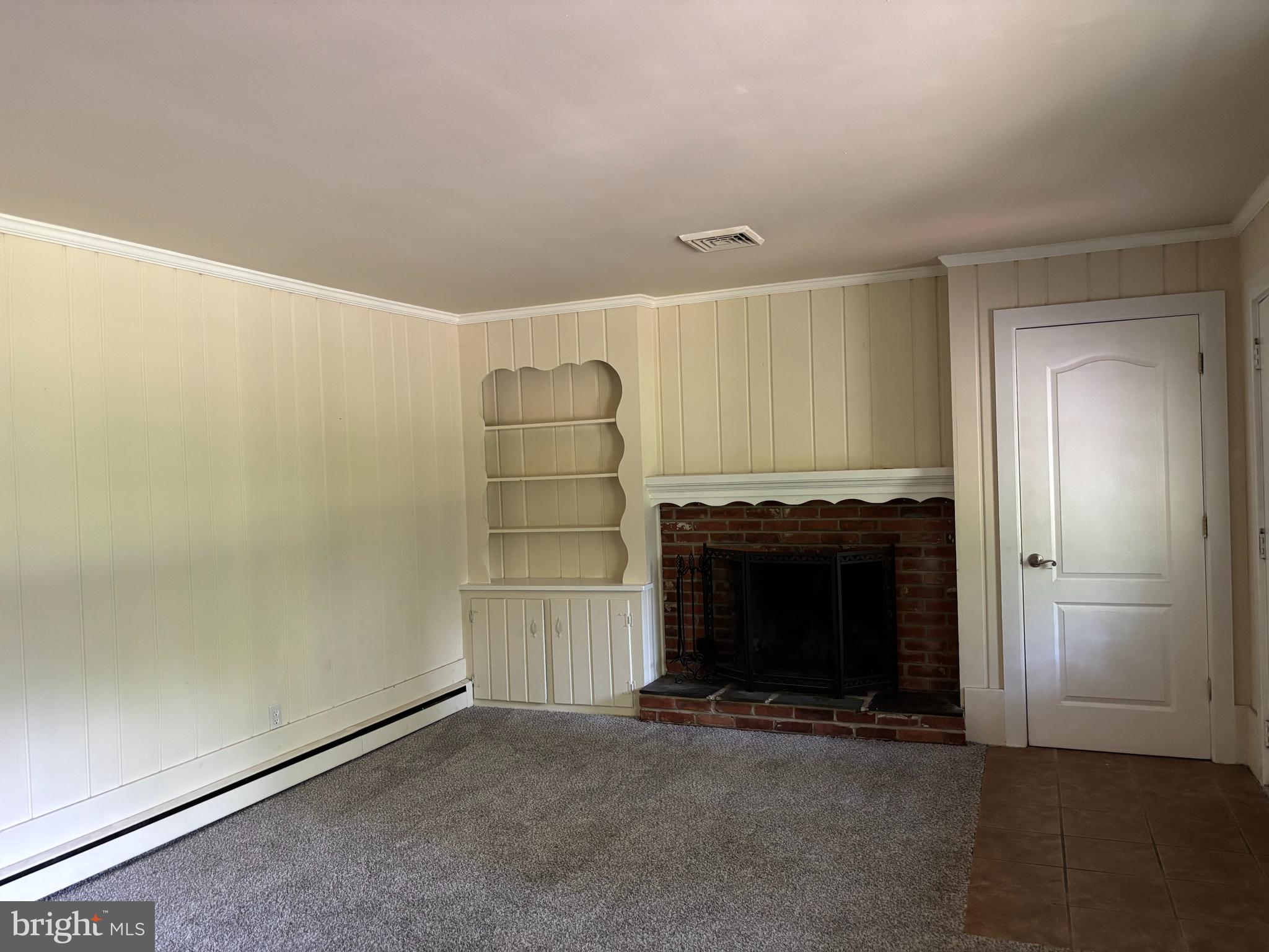 3 Cedar Trail Medford, NJ 08055 - Photo 2 of 22 an empty room with a fireplace