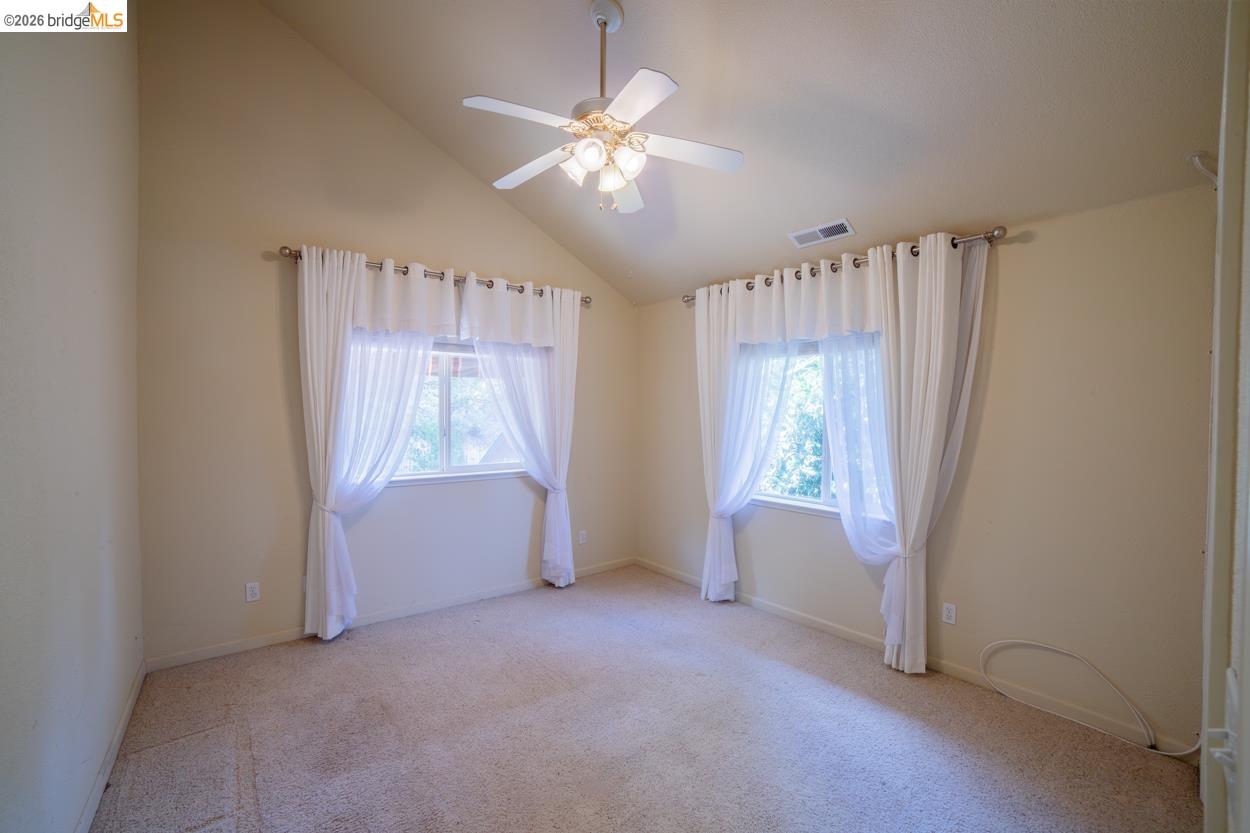 22401 Ridge Road Twain Harte, CA 95383 - Photo 28 of 52 Vaulted ceiling featuring a ceiling fan with integrated lighting