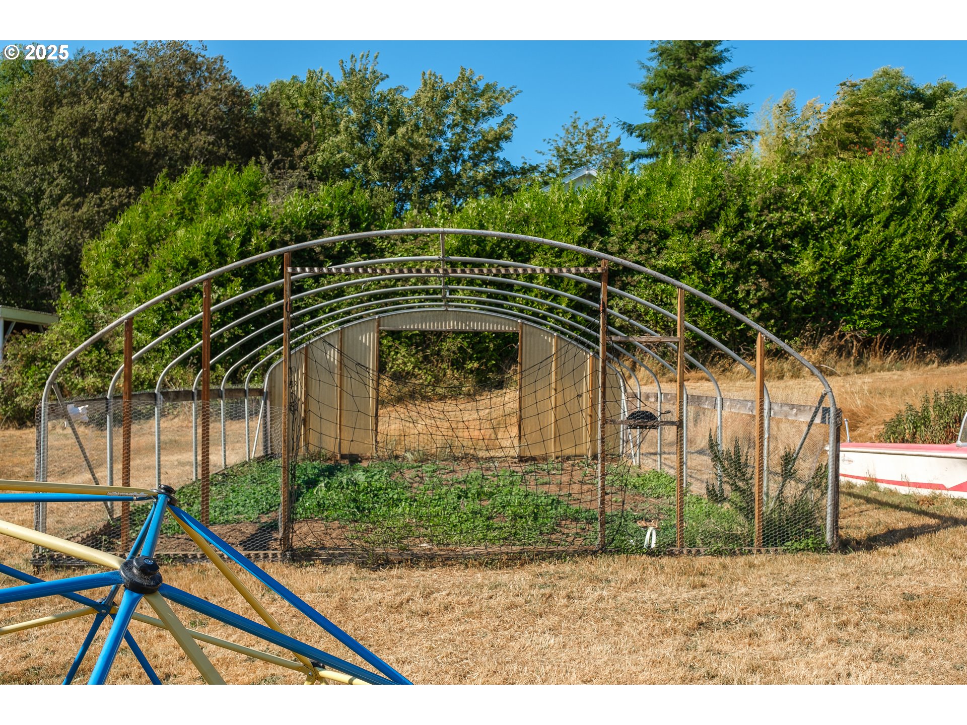 92693 T T Larson Road Astoria, OR 97103 - Photo 33 of 40 a front view of a house with garden