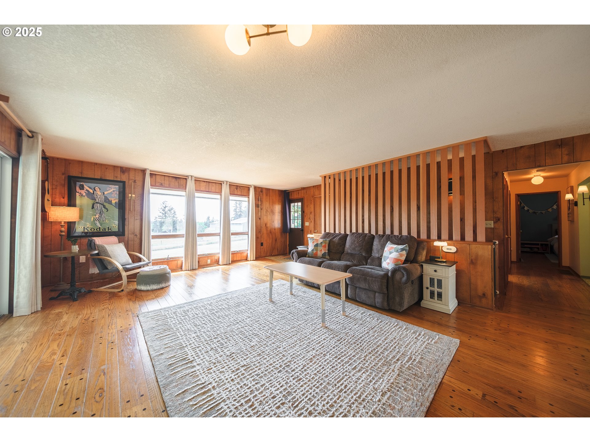 92693 T T Larson Road Astoria, OR 97103 - Photo 7 of 40 a living room with furniture and a large window