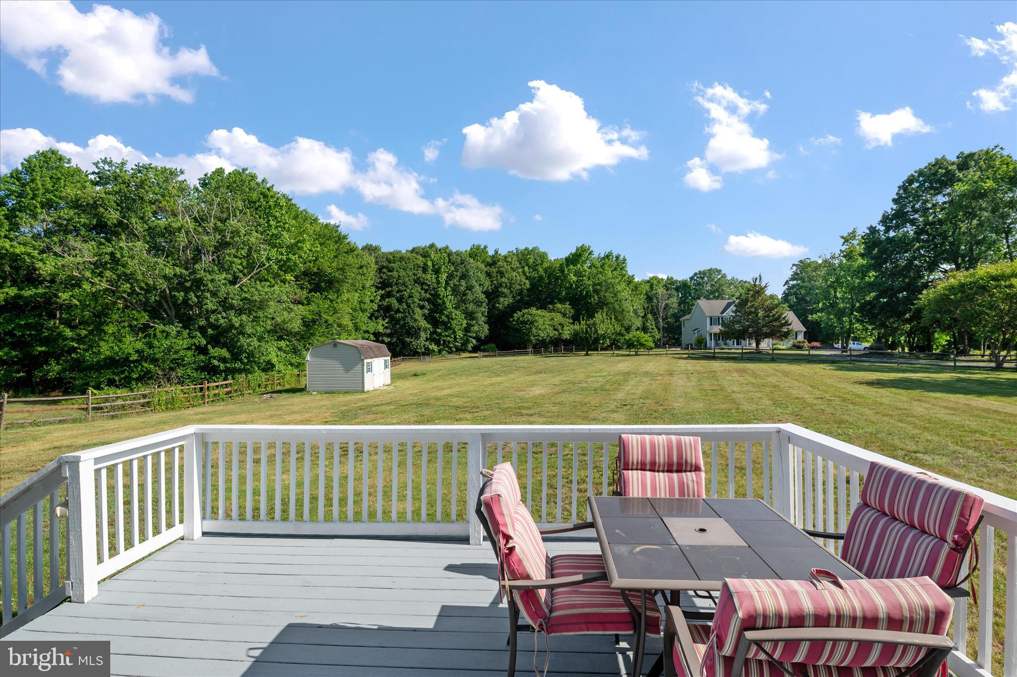 913 Clark Corner Road Centreville, MD 21617 - Photo 18 of 66 a view of a chairs and table on the terrace
