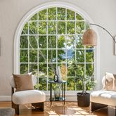 a living room with furniture and a window