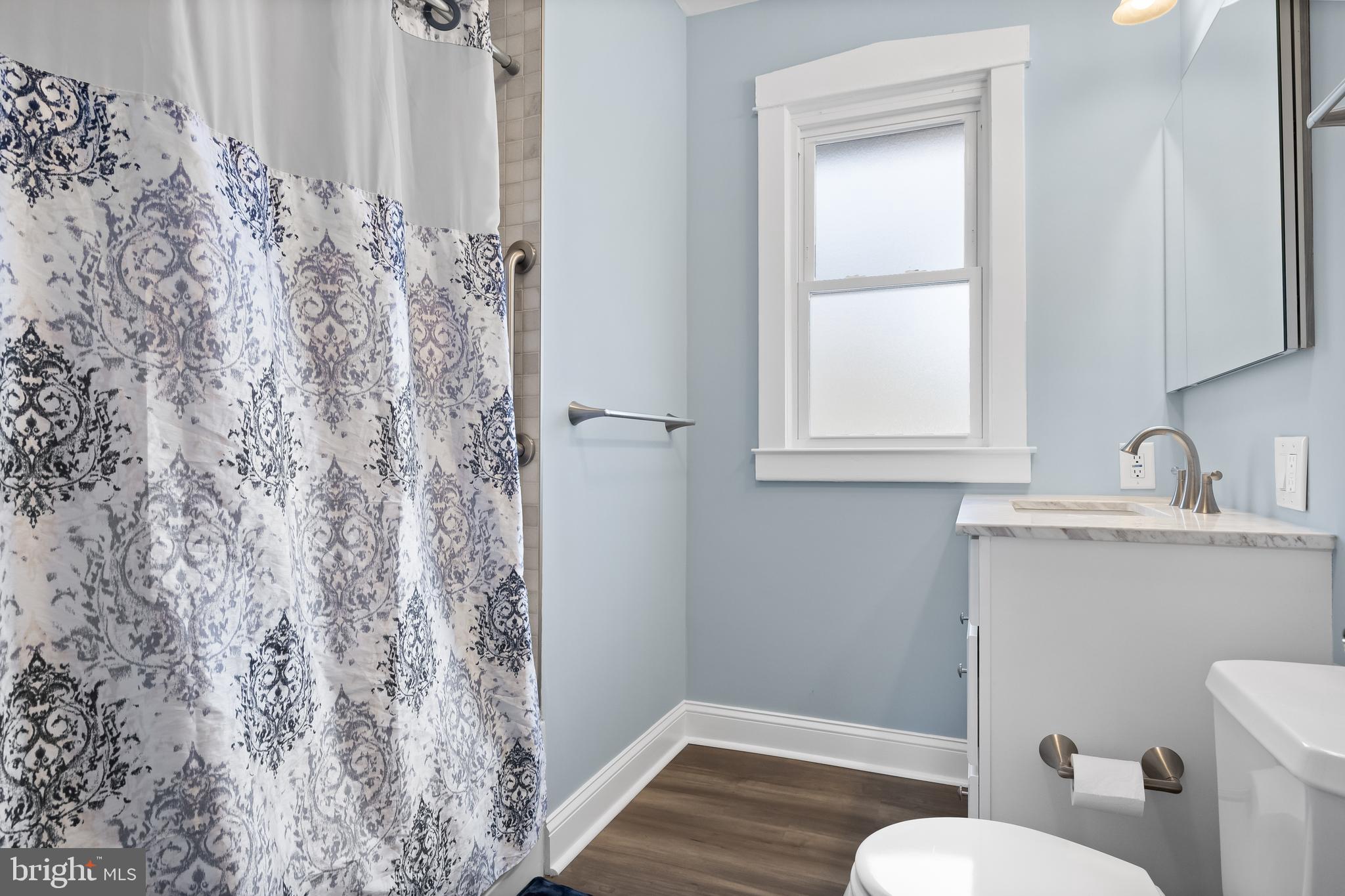 116 Fairmount Avenue Voorhees, NJ 08043 - Photo 18 of 37 a bathroom with a sink toilet and window