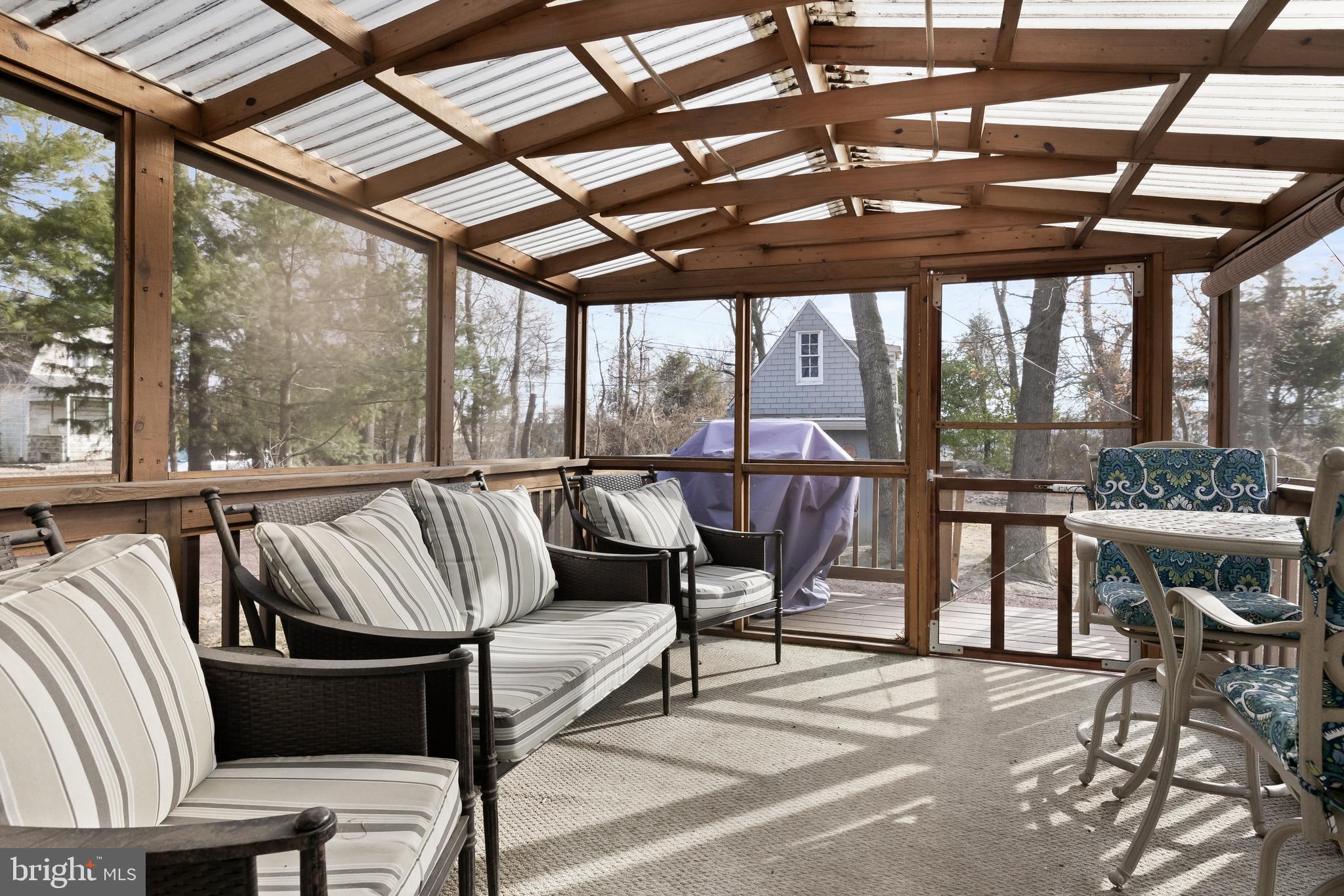 116 Fairmount Avenue Voorhees, NJ 08043 - Photo 20 of 37 a view of a patio with a table and chairs