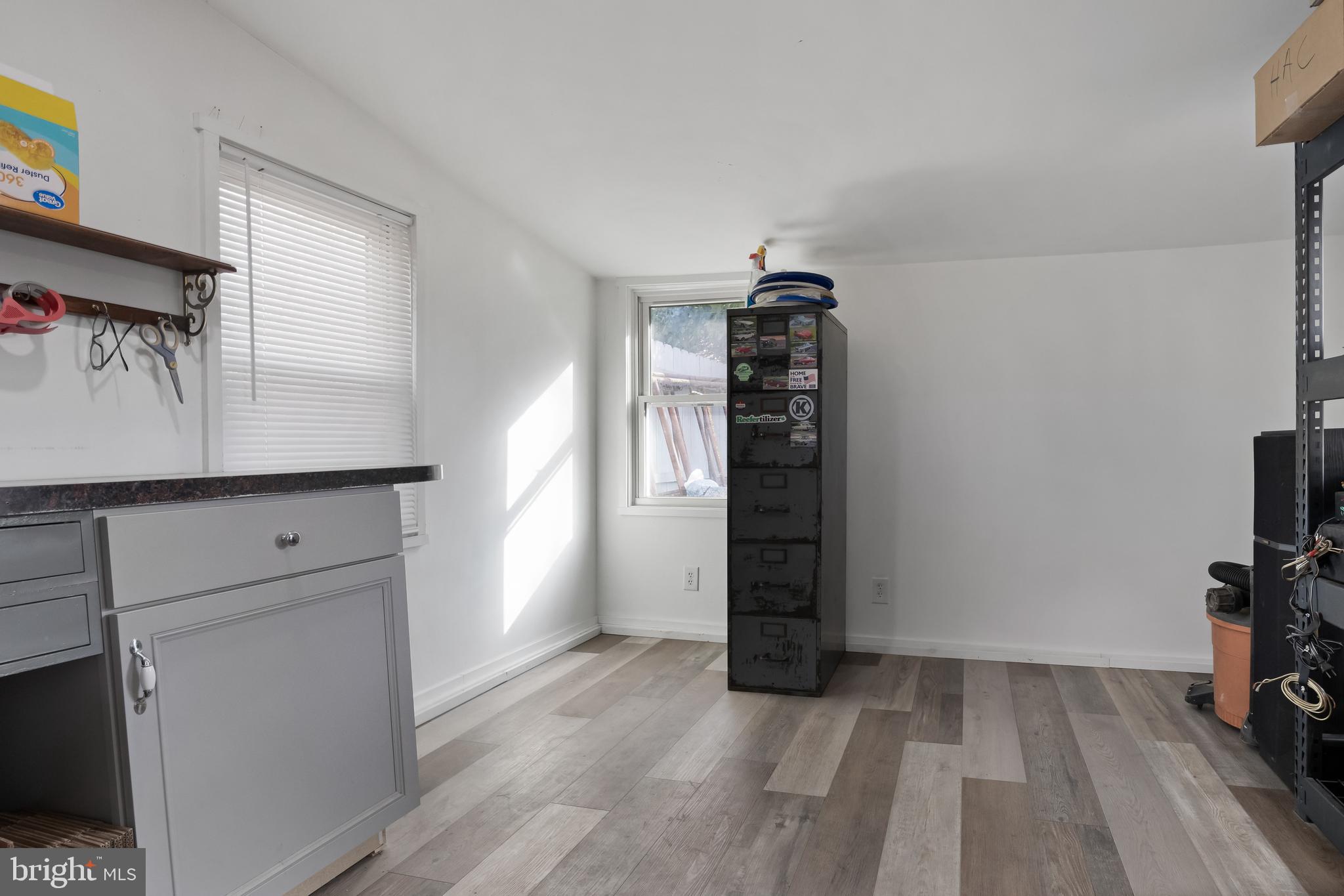 116 Fairmount Avenue Voorhees, NJ 08043 - Photo 31 of 37 a view of empty room with a fireplace and wooden floor