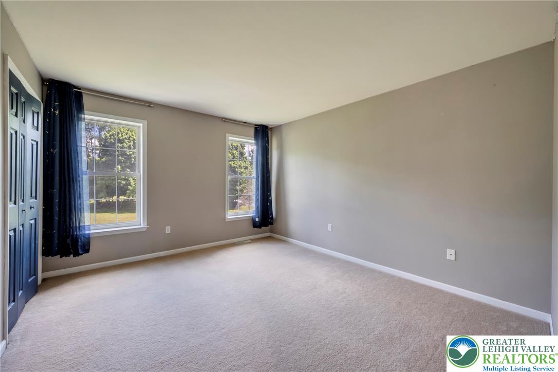 204 Bushkill Ridge Road Wind Gap, PA 18091 - Photo 31 of 48 A quiet retreat with plush carpet flooring and naturally illuminated interiors awaits you.