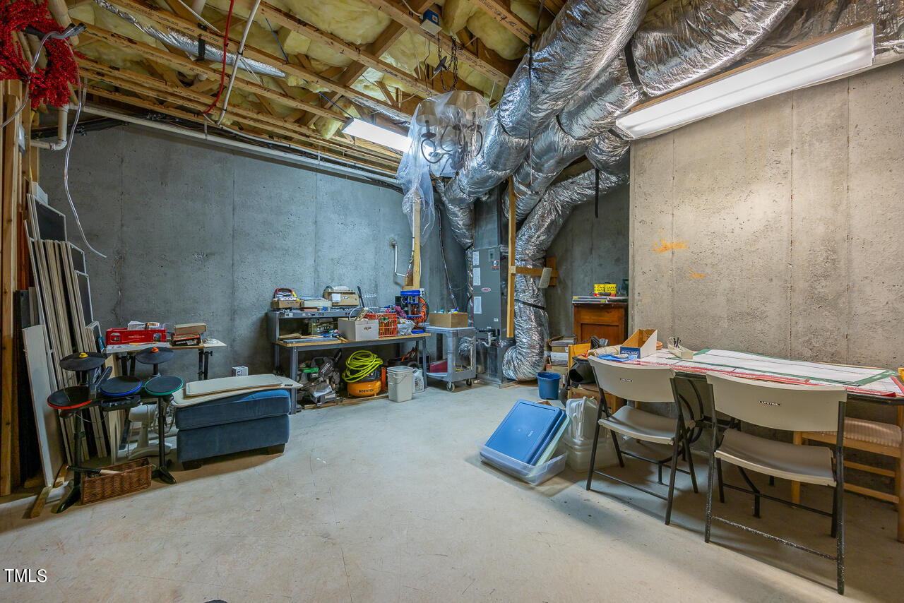7353 Newport Avenue Raleigh, NC 27613 - Photo 40 of 51 Unfinished Basement Storage