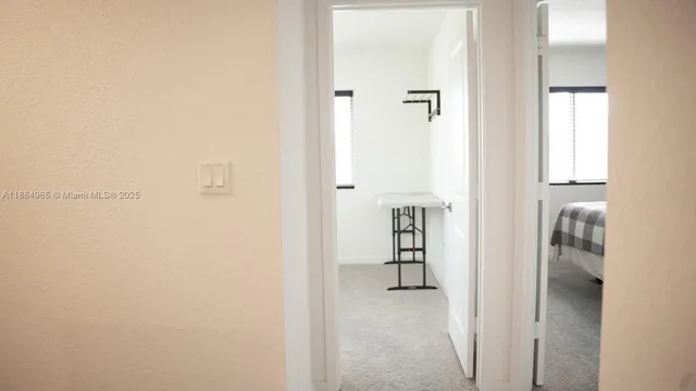 a room with furniture and a flat screen tv