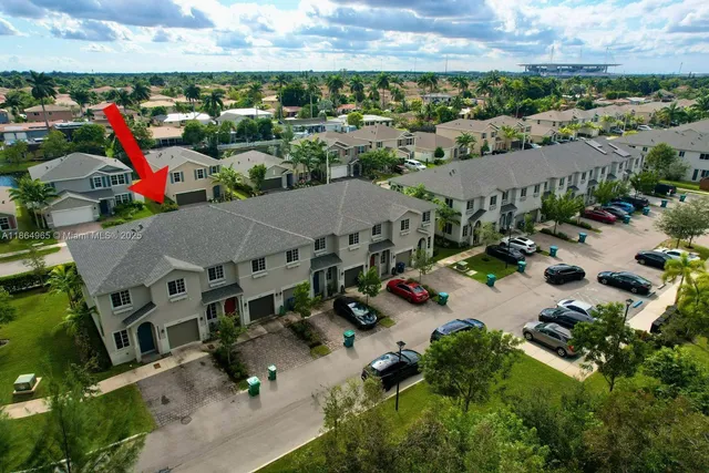 an aerial view of multiple house