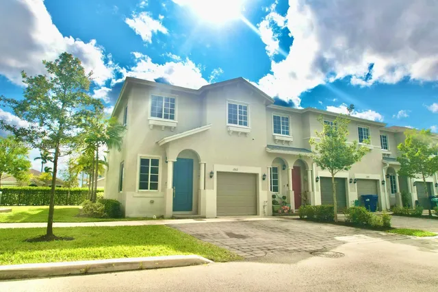 a view of street with houses