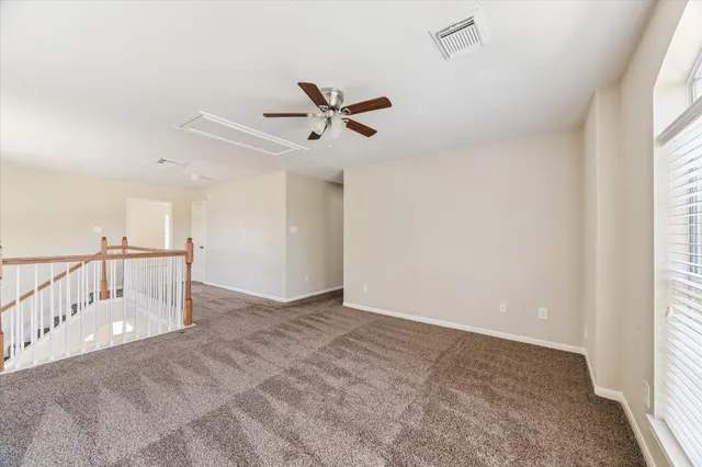 a view of a room with a window