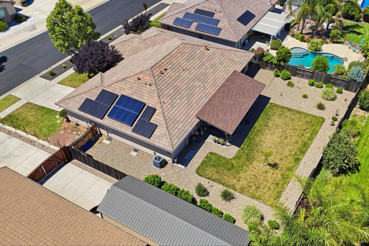 2011 Roy Ranch Way Plumas Lake, CA 95961 - Photo 37 of 49 an aerial view of a house with a yard and garden