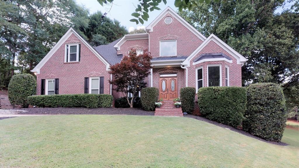 7125 River Heights Suwanee, GA 30024 - Photo 1 of 1 Welcome to this gorgeous four-sided brick home!