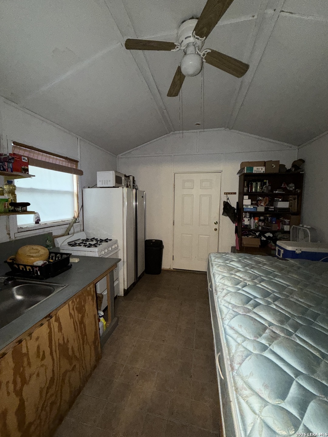 46071 SD 46071 Rocksprings, TX 78880 - Photo 36 of 70 a kitchen with refrigerator and window