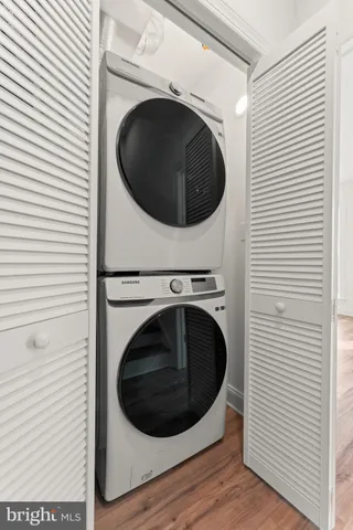 a utility room with washing machine and dryer