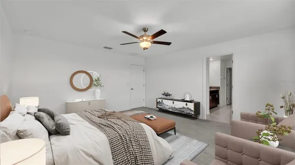 a bedroom with a bed and window