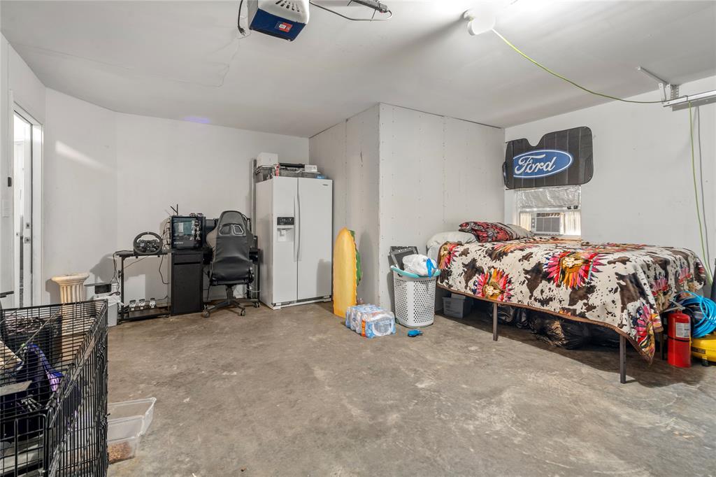 420 Whitney Court Rio Vista, TX 76093 - Photo 22 of 25 a bed room with a bed and a chair