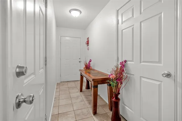 a view of a hallway with interior of the house