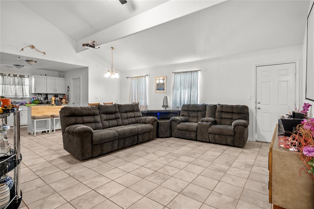 420 Whitney Court Rio Vista, TX 76093 - Photo 4 of 25 a living room with furniture and a view of kitchen