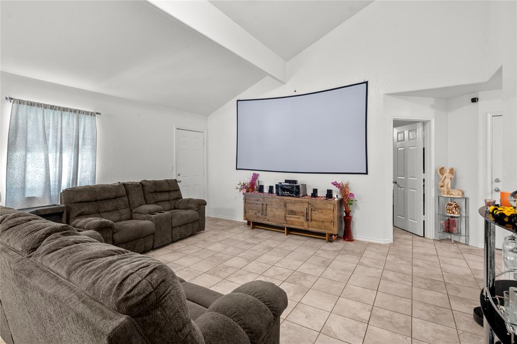 420 Whitney Court Rio Vista, TX 76093 - Photo 5 of 25 a living room with furniture and a flat screen tv