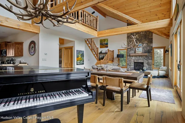 a living room with granite countertop furniture and a table