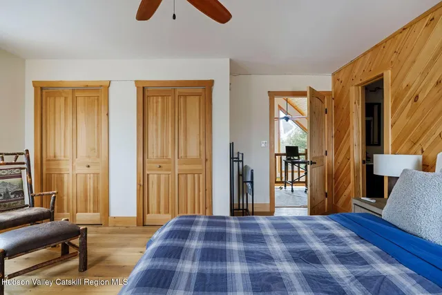 a small pool with a garden and plants