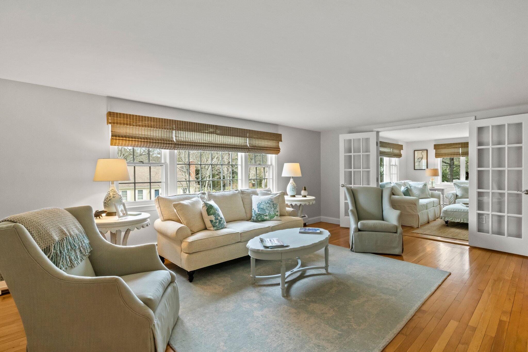 29 Jesse Eldredge Road Harwich, MA 02645 - Photo 13 of 56 a living room with furniture and a large window