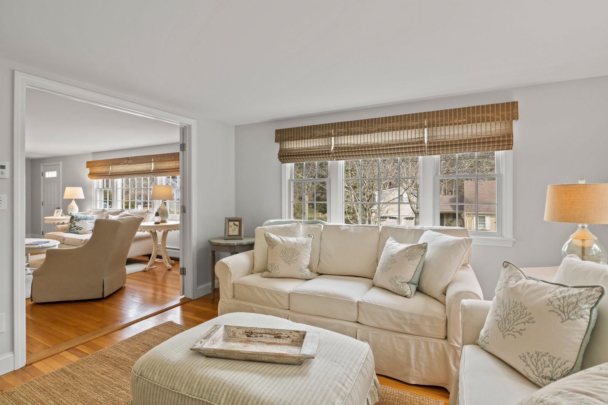29 Jesse Eldredge Road Harwich, MA 02645 - Photo 15 of 56 a living room with furniture and a large window