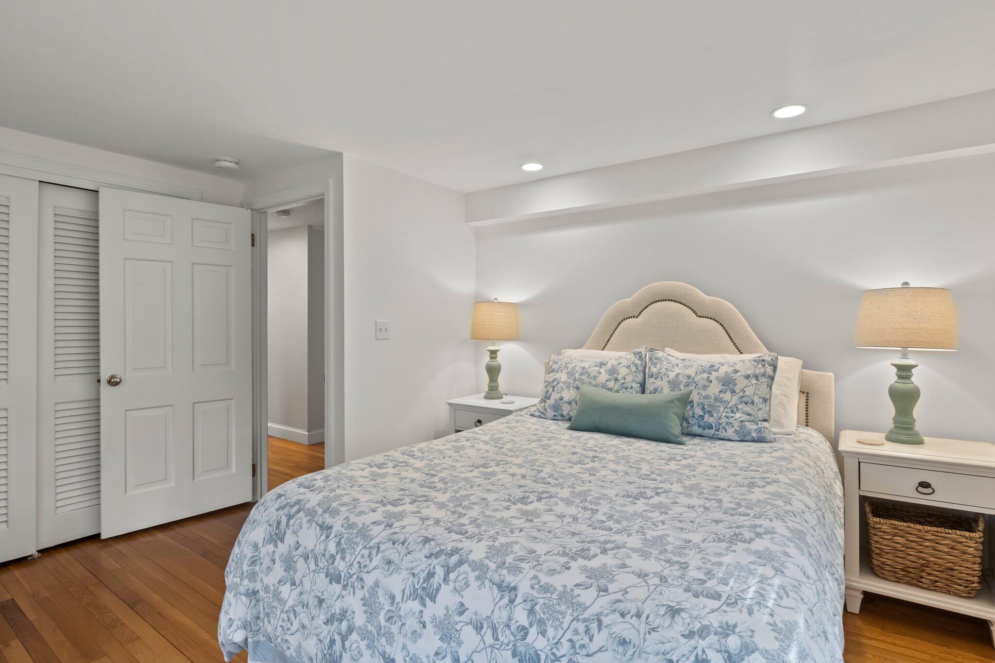 29 Jesse Eldredge Road Harwich, MA 02645 - Photo 18 of 56 a bedroom with a bed and a dresser