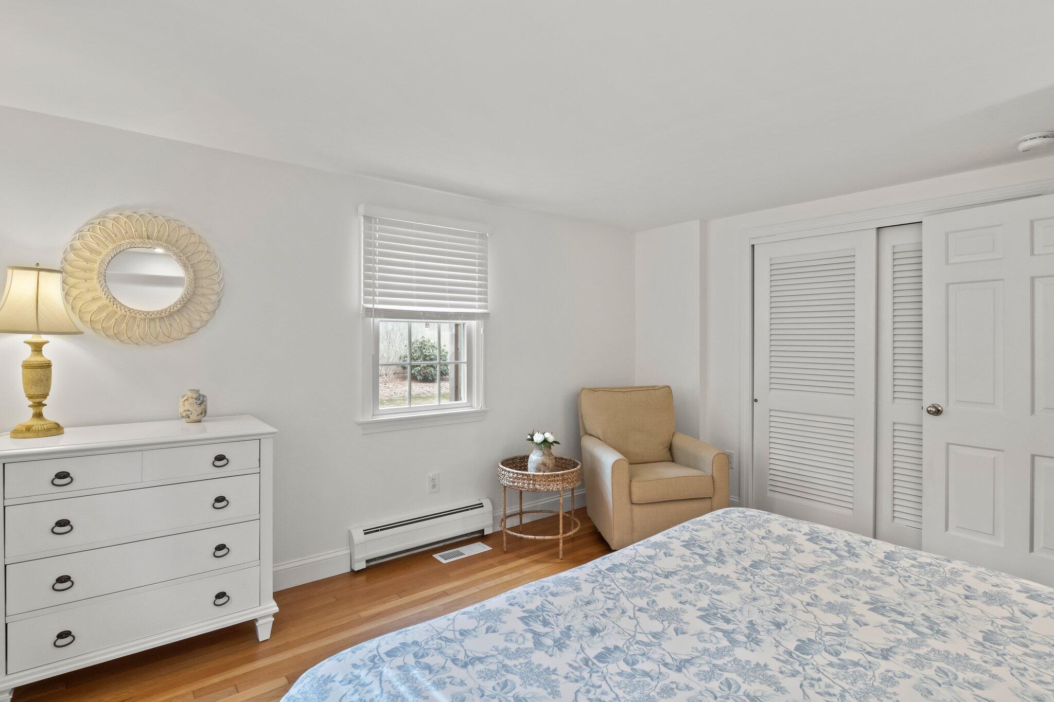 29 Jesse Eldredge Road Harwich, MA 02645 - Photo 19 of 56 a bedroom with a bed and a dresser