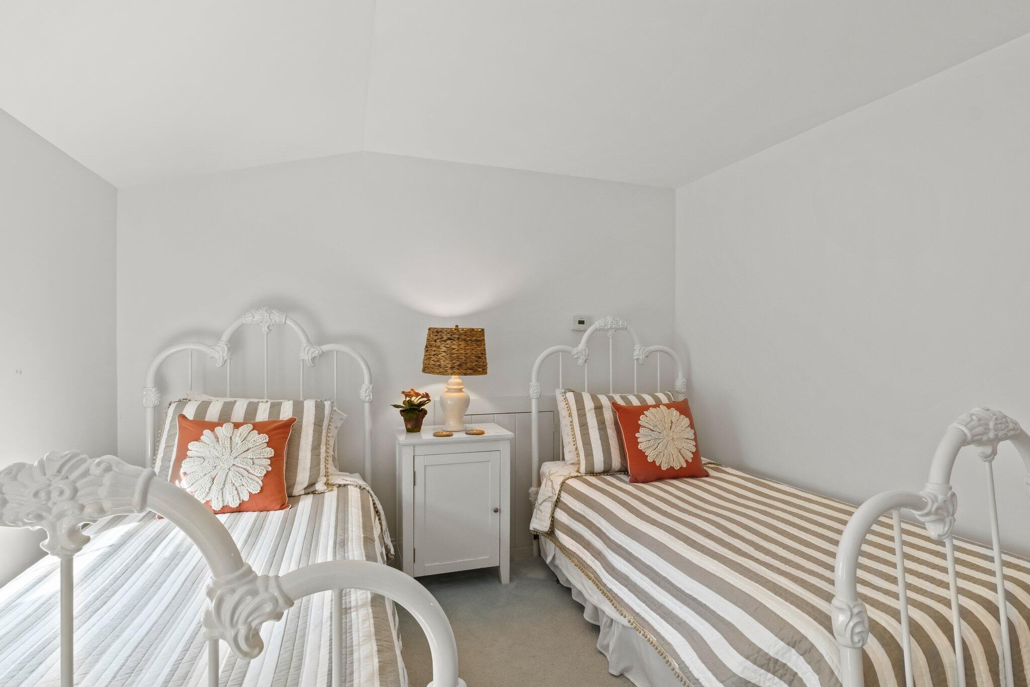 29 Jesse Eldredge Road Harwich, MA 02645 - Photo 33 of 56 a bedroom with a bed and wooden floor