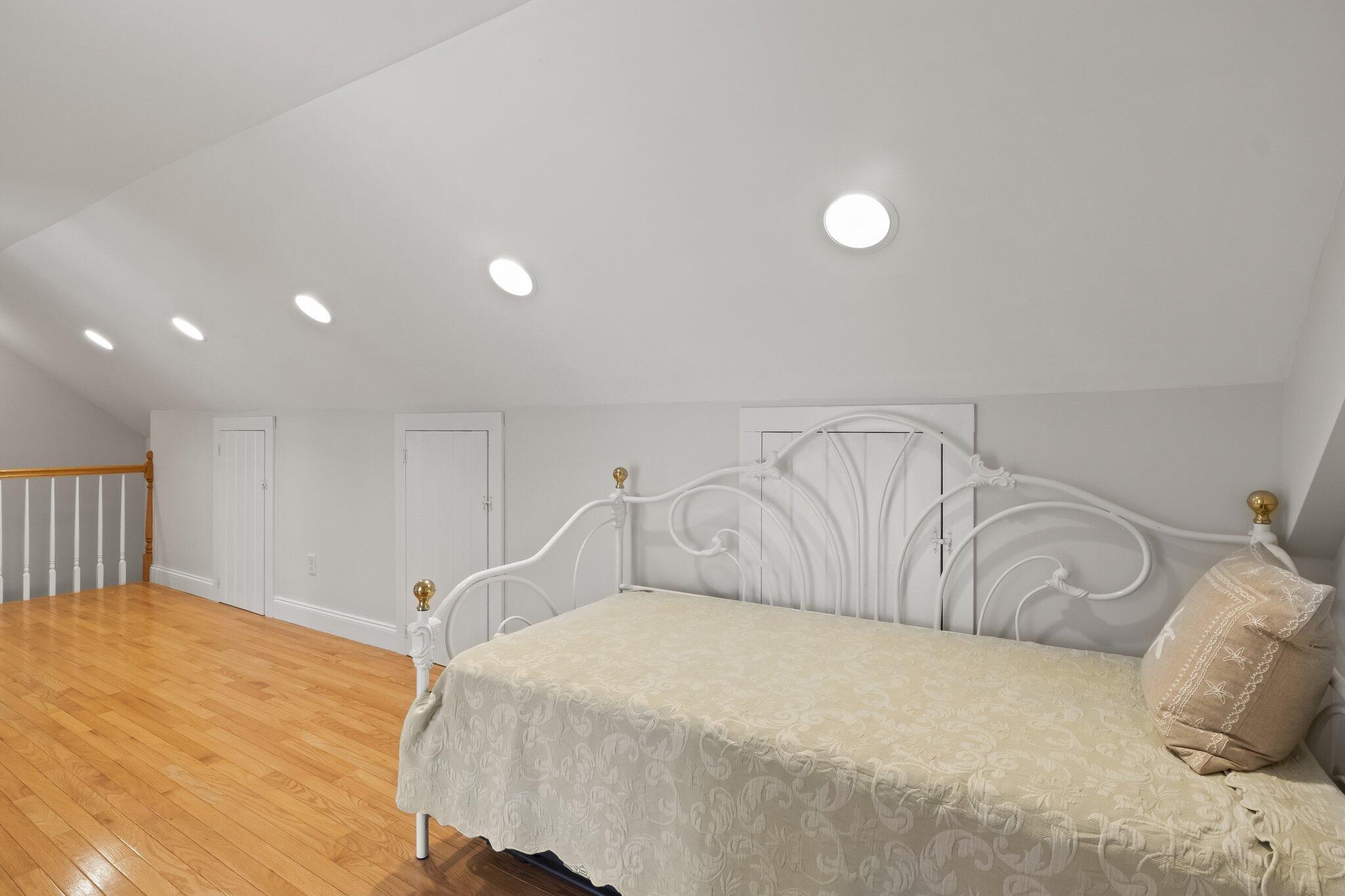 29 Jesse Eldredge Road Harwich, MA 02645 - Photo 34 of 56 a bed room with a bed and a night stand